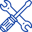 Crossed wrench and screwdriver icon in blue representing electrical tools.