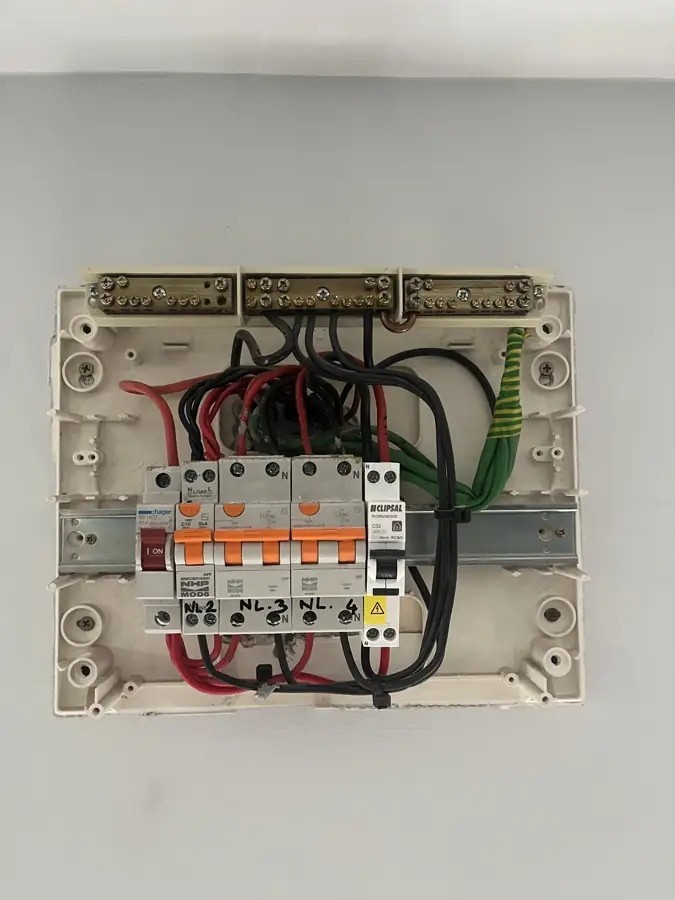 Open residential switchboard showing circuit breakers and RCD protection upgraded for a stove circuit in a Yokine home